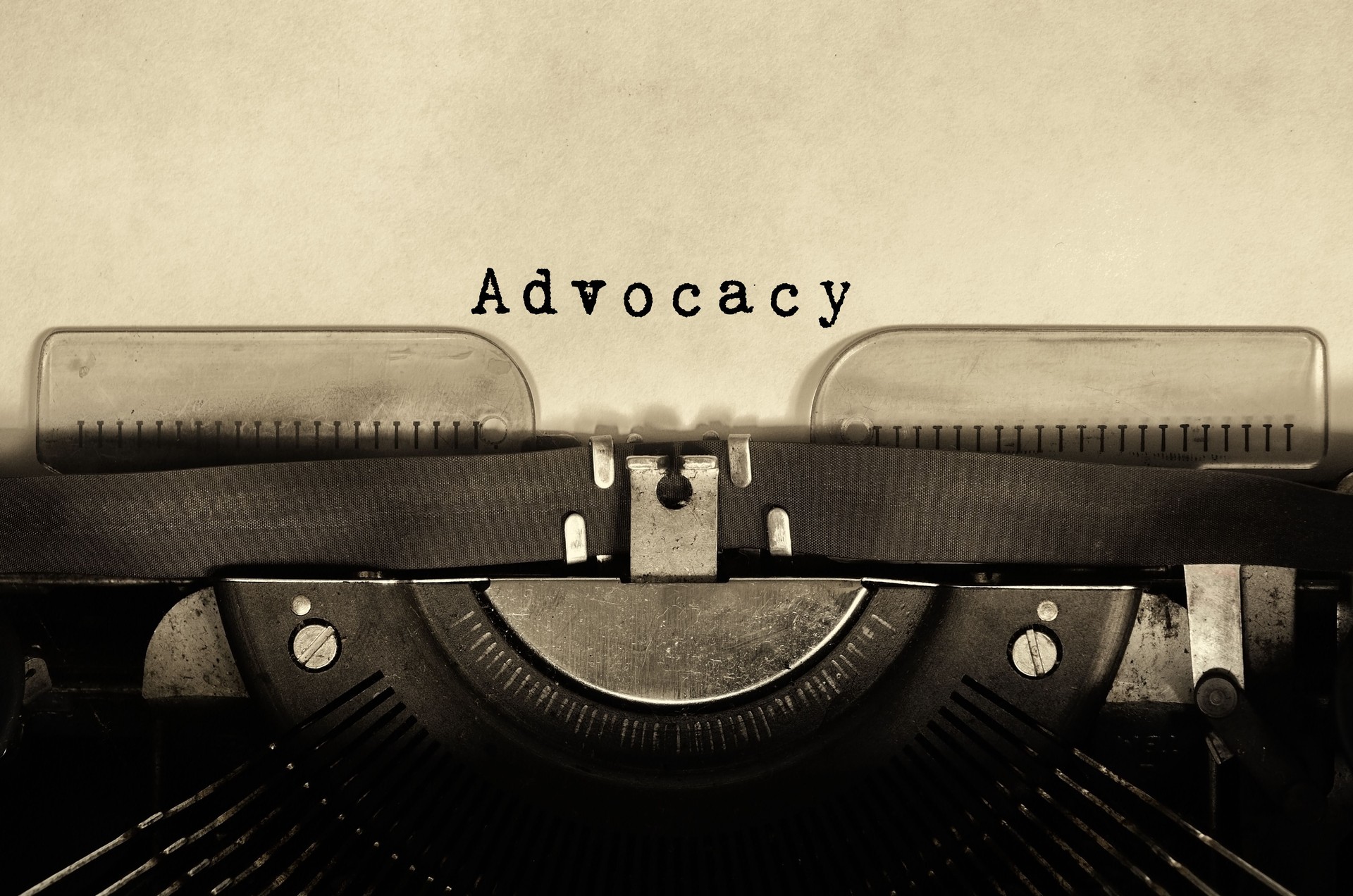 Advocacy word typed on vintage typewriter